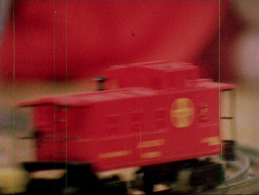  photo William_s Doll Lionel Cannonball train set - train running - closeup caboose_zpsnz2uhmuw.jpg